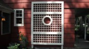 Square lattice trellis with custom port hole